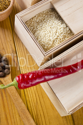Set of spices in wooden boxes