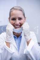 Portrait of female dentist smiling