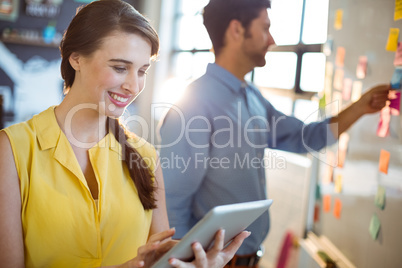 Female business executive using digital tablet