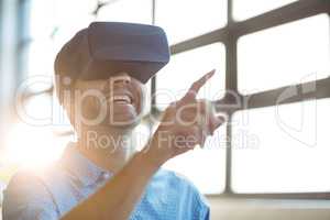 Male business executive using virtual glasses