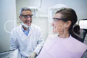 Dentist interacting with patient
