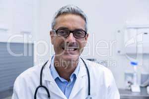 Portrait of dentist in spectacles