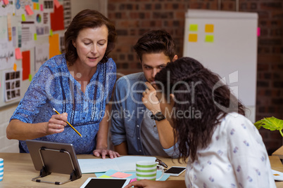 Business people interacting in office