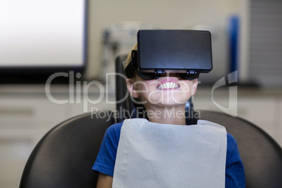 Boy using virtual reality headset during a dental visit