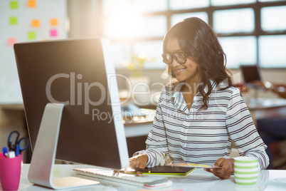 Graphic designer working on computer