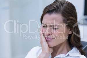 Unhappy woman having a toothache