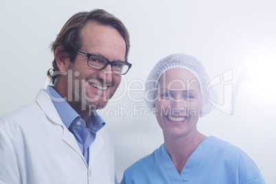 Portrait of dentist and dental assistant wearing surgical mask