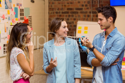 Business people interacting at workplace