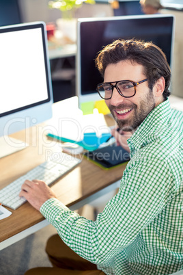 Graphic designer working on computer