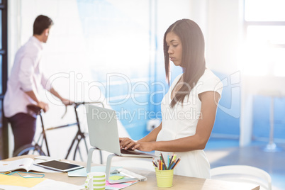 Business executive using laptop