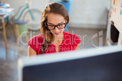 Graphic designer working on computer