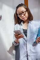 Young woman using listening song and using mobile phone