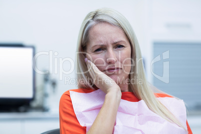 Unhappy woman having a toothache