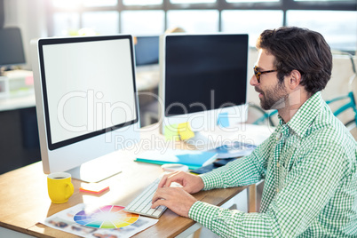 Graphic designer working on computer