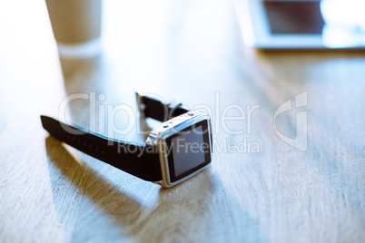 Smartwatch on wooden table