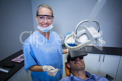 Man using virtual reality headset during a dental visit