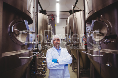 Manufacturer standing at brewery