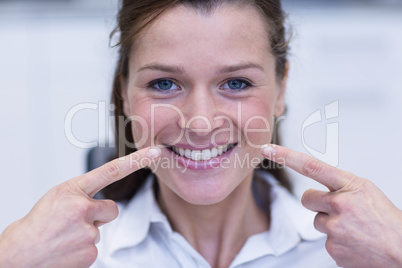 Female patient showing her teeth