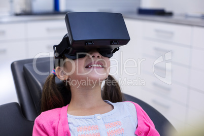 Girl using virtual reality headset during a dental visit