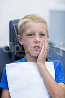 Unhappy young patient having a toothache