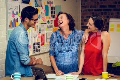 Business people interacting in office