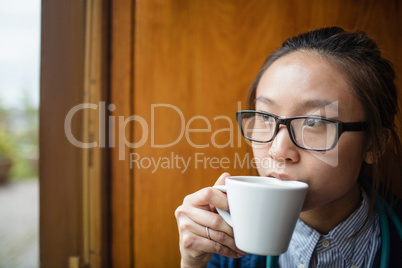 Female doctor having tea in clinic