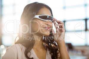 Businesswoman using virtual 3d glasses