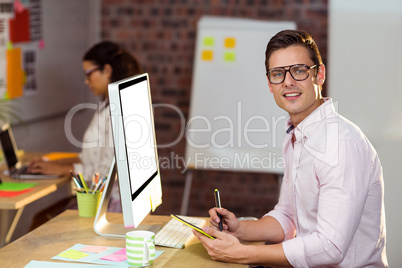 Business executive using graphic tablet