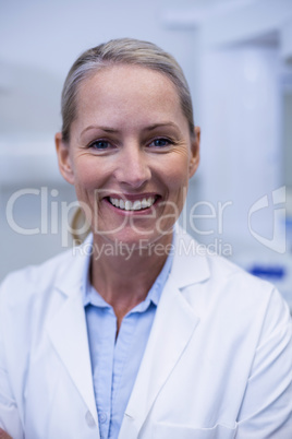 Portrait of female dentist smiling