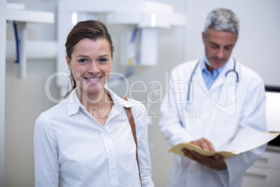 Female patient smiling at dental clinic