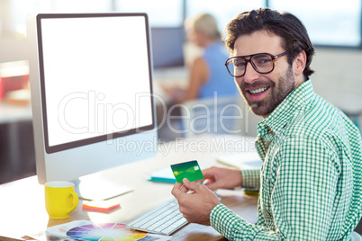 Graphic designer doing online shopping