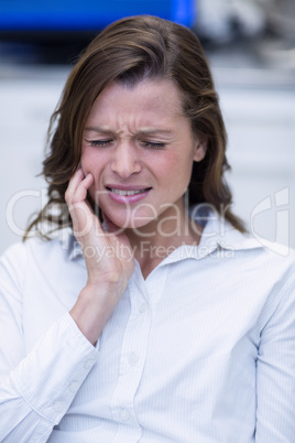 Woman suffering from toothache