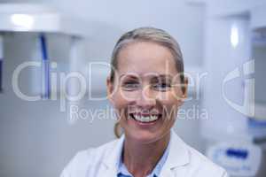 Portrait of female dentist smiling