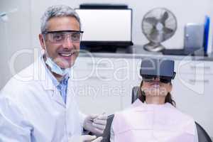 Female patient virtual reality headset during a dental visit