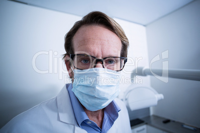 Portrait of dentist wearing surgical mask