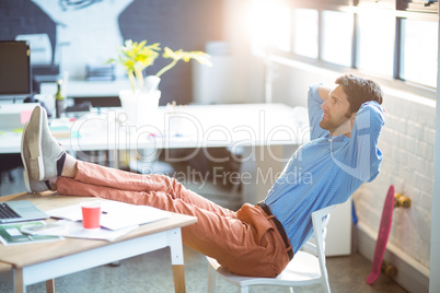 Male business executive relaxing