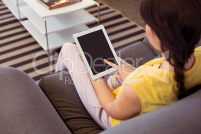 Female business executive using digital tablet