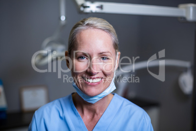 Dental assistant smiling in clinic