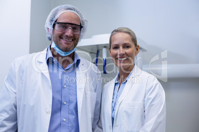 Portrait of male and female dentist smiling