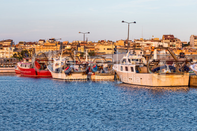 Fishing motor boat on the harbor in Palamos bay of Spain