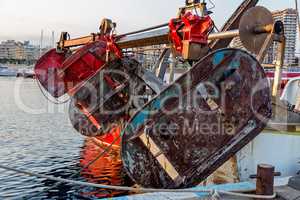 Fishing motor boat on the harbor in Palamos bay of Spain