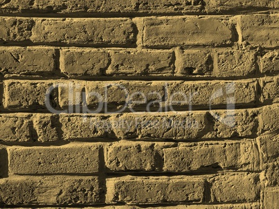 Red brick wall background sepia