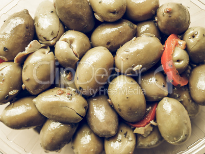 Green olives vegetables background vintage desaturated