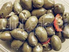 Green olives vegetables background vintage desaturated