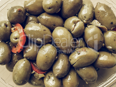 Green olives vegetables background vintage desaturated