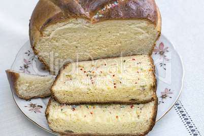 Appetizing sweet white bread on the plate.