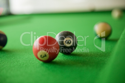 Billard balls on green billard table