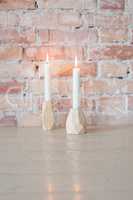Two candlelights on table