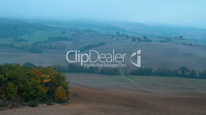 Dense Morning Fog in the Hills of Tuscany. Time Lapse