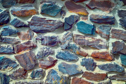 The texture in the form of a wall of colored quartz